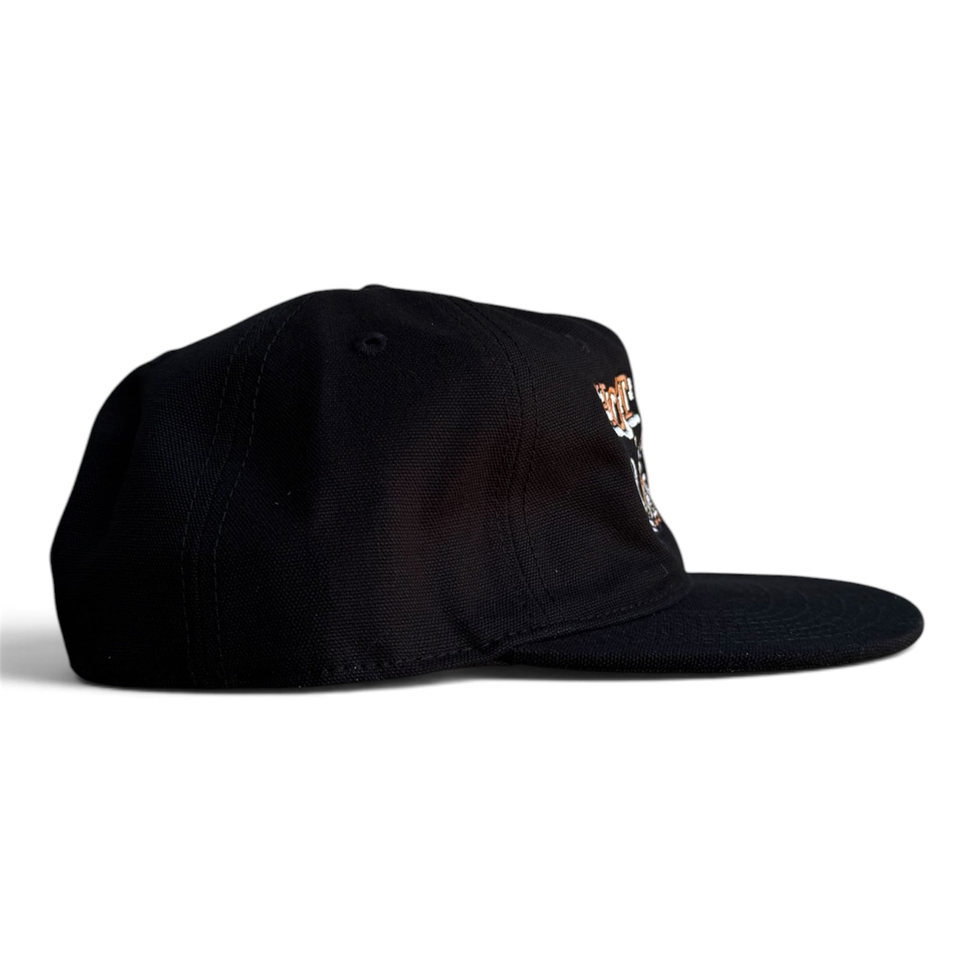 A vintage inspired black flat-brim canvas cap featuring embroidered text and a graphic on the front. The embroidery reads 'HOT PIPES Motorcycle Show BEND, OREGON' with an illustration of a person on a vintage motorcyle. 